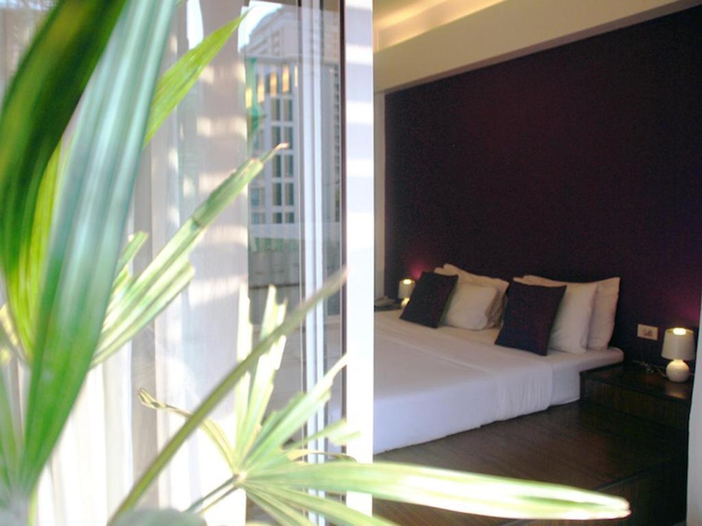 Baan Saladaeng Boutique Guesthouse Бангкок Номер фото