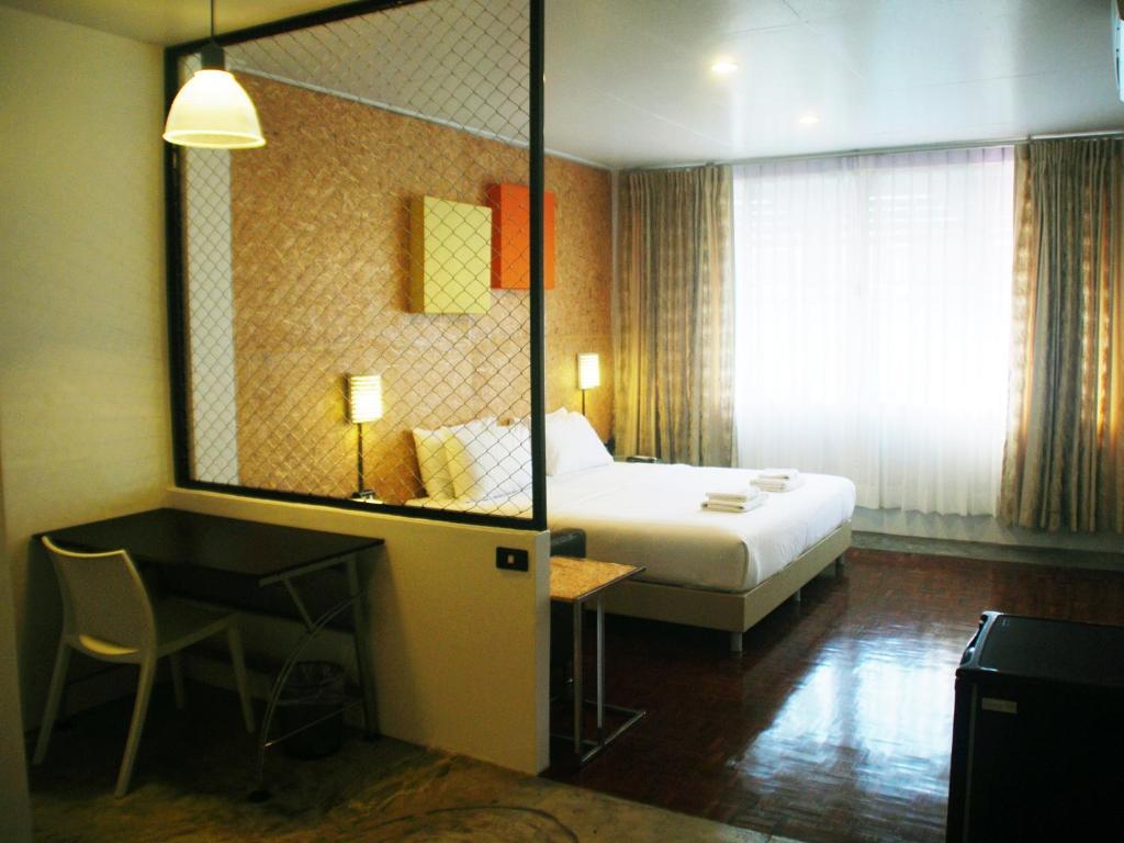 Baan Saladaeng Boutique Guesthouse Бангкок Номер фото